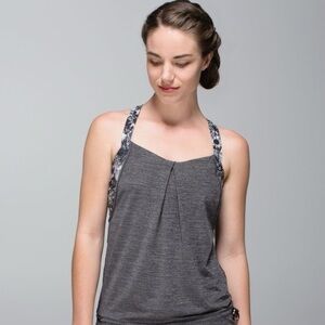 Lululemon Rest Less Tank
Heathered Black / Flowabunga Black Angel Wing. Size 2